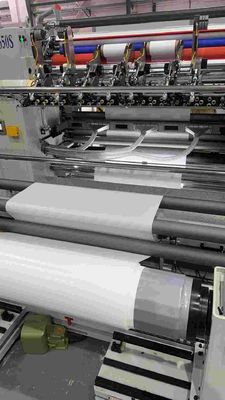 Machines de repassage de rouleaux de papier